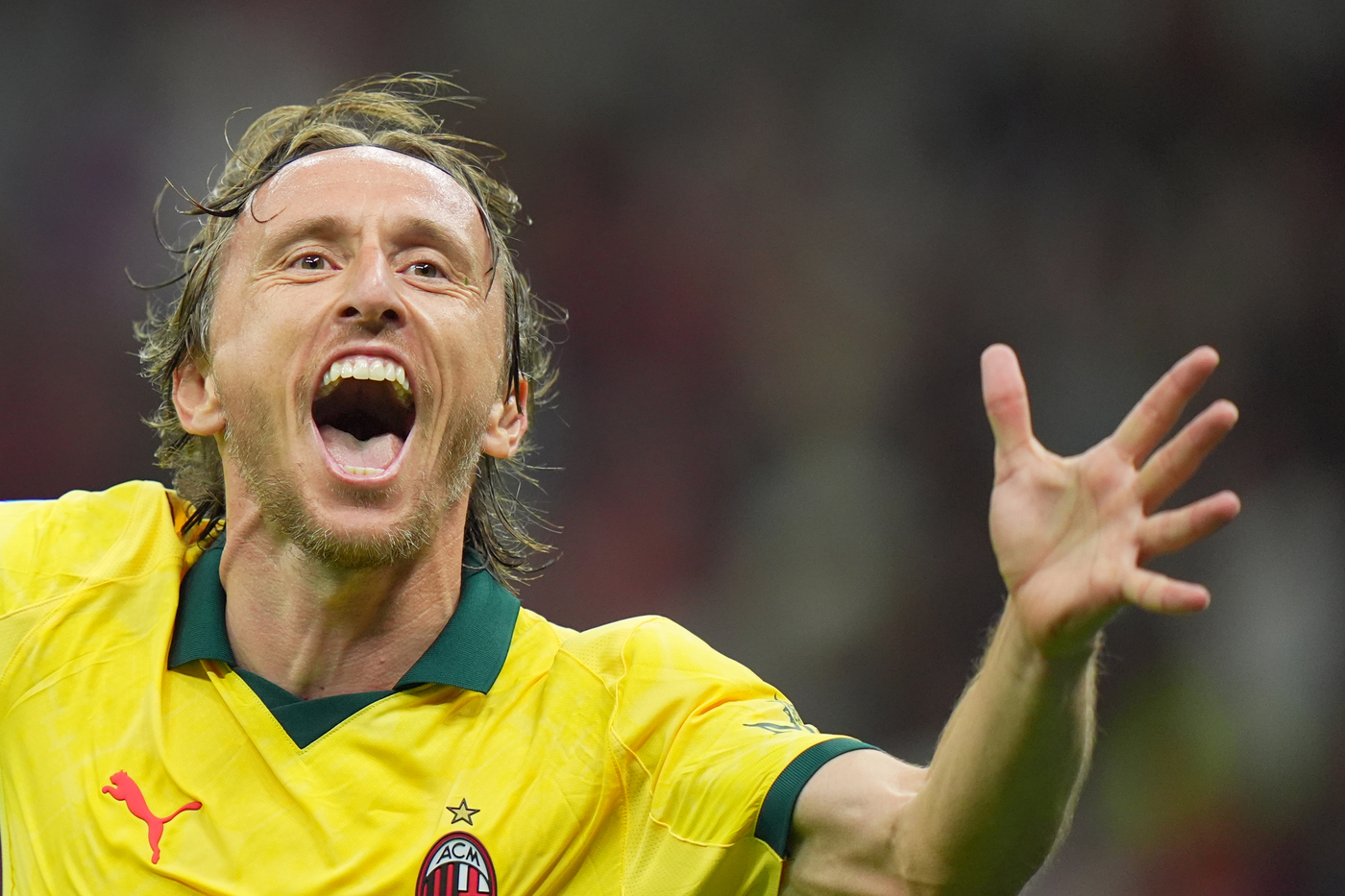Luka Modric esulta per un gol segnato al Bologna Rossonerisiamonoi.it